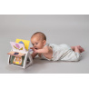 TAF TOYS KSIĄŻECZKA OBRACAJĄCA SIĘ TUMMY TIME