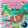 Poszukaj zwierzątek na łące. Książka z latarką